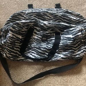 Victoria’s Secret duffel bag.